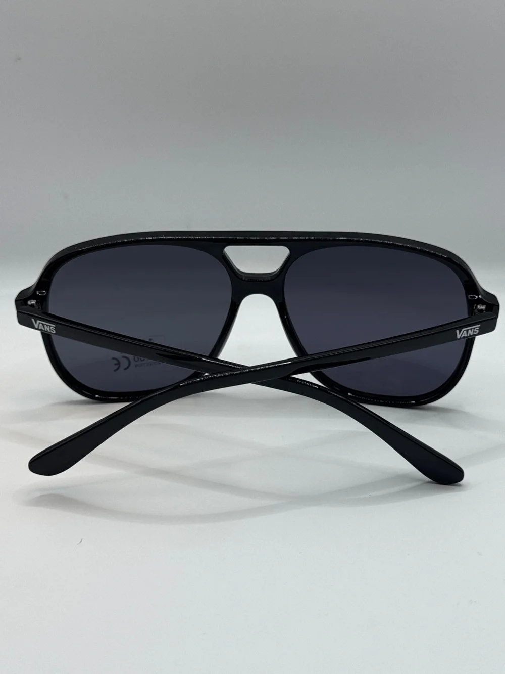 Vans Glossy Black Sunglasses with Blue-Tinted Lenses